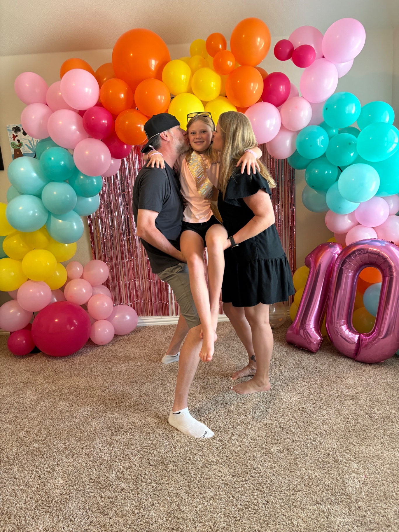 Rainbow organic balloon garland for 10th birthday
