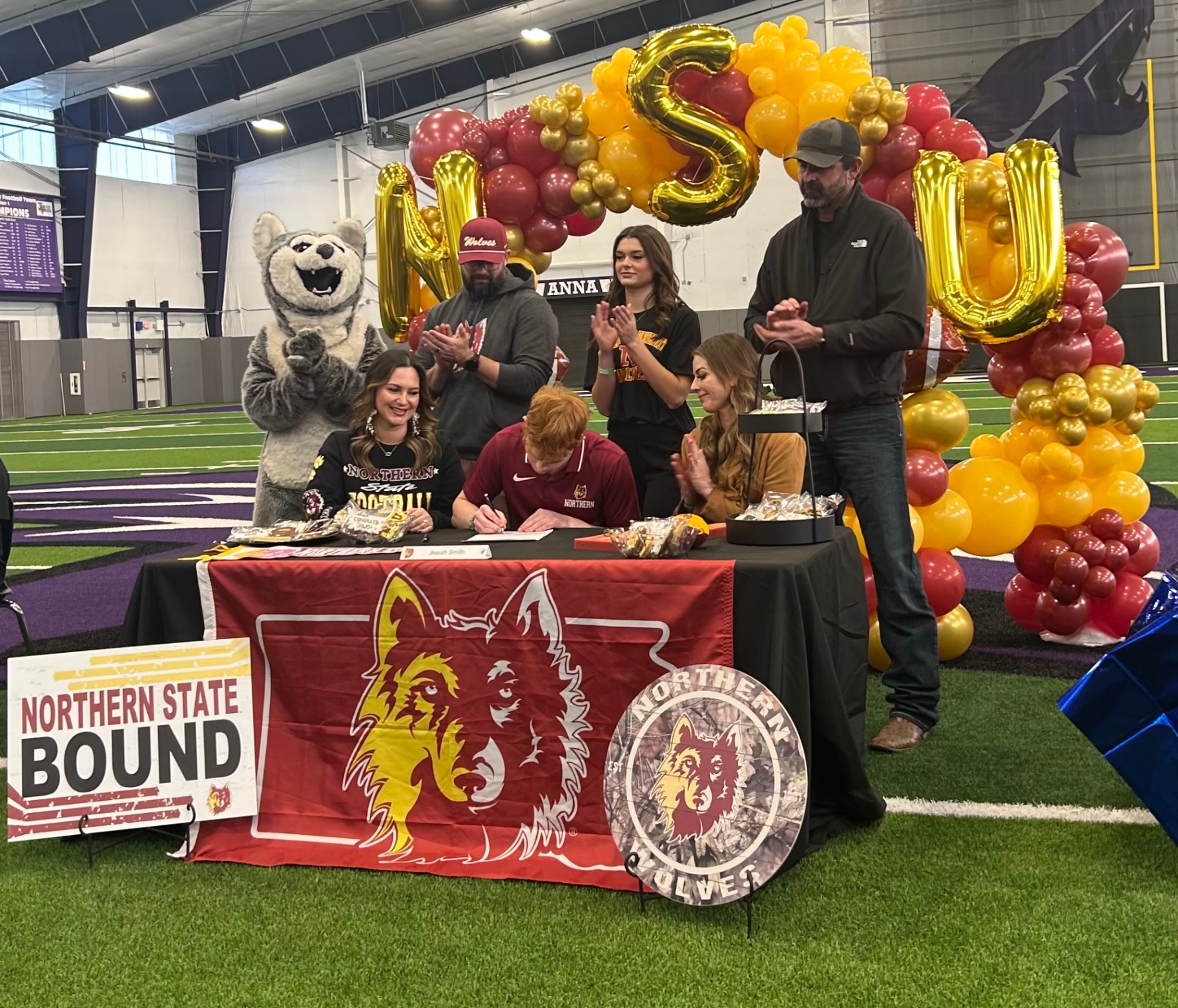 Maroon and gold Northern State signing day garland