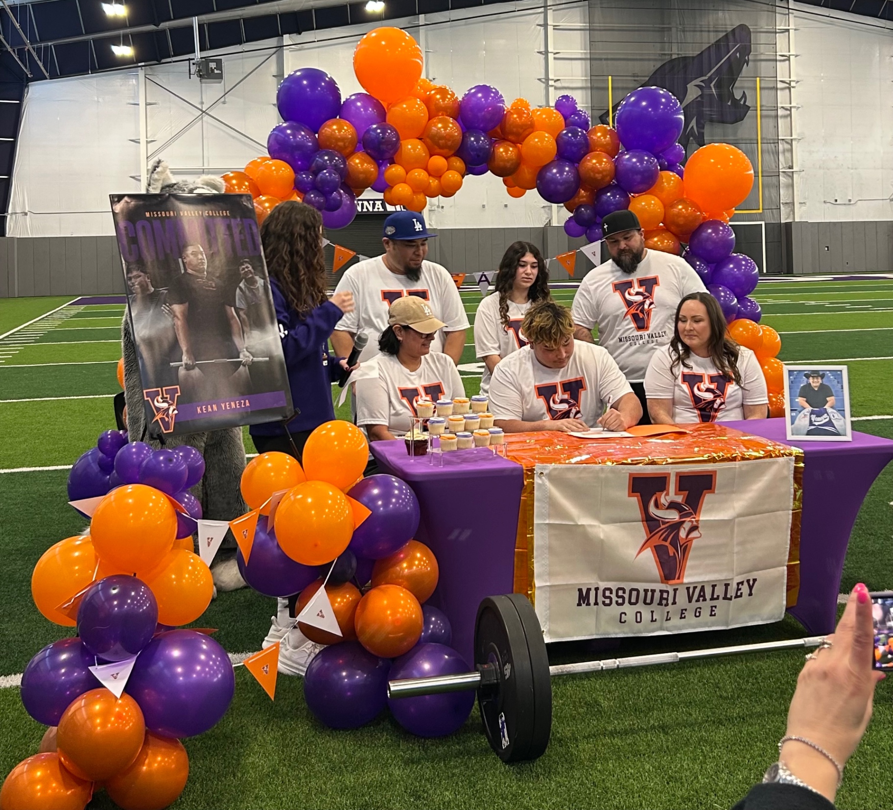 Orange and purple Missouri Valley signing day arch